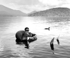 James in Innertube with Duck, Lake Placid, New York, 2006, Archive Number: EBR-0706-029-44, 16 x 20 Silver Gelatin Photograph