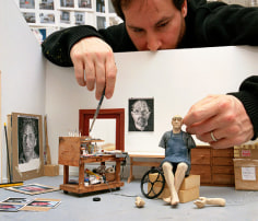Sculptor with model of Chuck Close in his summer studio, Norwalk, CT, 2005