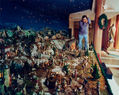 Man in church basement with Nativity scene, Brooklyn, NY, 2002