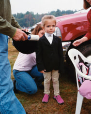 Girl being prepared for a horse show, Sandwich, NH, 2004