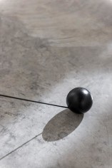 Magdalena Fern&aacute;ndez, 2i000.017 (detail), 2017. Iron spheres with black elastic cord, variable dimensions