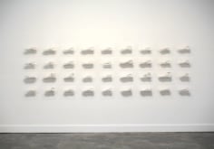 Clarissa Tossin, Ladr&atilde;o de T&ecirc;nis (Sneaker Thief), 2009. Hydrocal and acrylic shelves, dimensions variable.