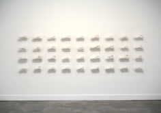 Clarissa Tossin, Ladr&atilde;o de T&ecirc;nis (Sneaker Thief), 2009. Hydrocal and acrylic shelves. Dimensions variable.