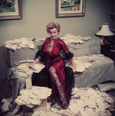 Slim Aarons, Fan Mail, 1952: Marilyn Monroe sorts out her fan mail shortly after her film “The Asphalt Jungle” had been released, Beverly Hills