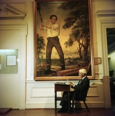 Slim Aarons, American poet and biographer of Abraham Lincoln, Carl Sandburg, beneath the 'rail-splatter' portrait of the president of Chicago Historical Society Museum