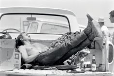 John Dominis, Steve McQueen sleeping in the back of his pick up truck, California, 1963