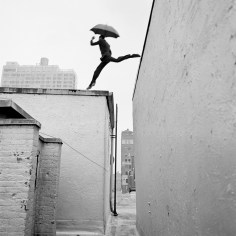 Rodney Smith, Reed Leaping Over Rooftop, New York, New York, 2007