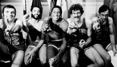 George Kalinsky, The Knicks at the NBA Championships: Jerry Lucas, Walt Frazier, Willis Reed, Phil Jackson, and Bill Bradley seated in locker room, Los Angeles, 1973