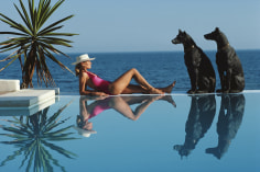 Slim Aarons, Pantz Pool, 1985: Laura Hawk, assistant to the photographer, relaxes by the pool at El Rincon, the von Pantz' Marbella home
