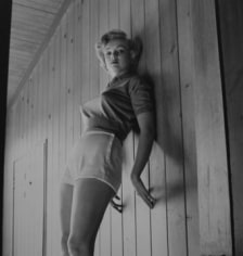 Murray Garrett,  Marilyn Monroe (leaning on wall)