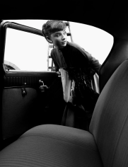 Bob Willoughby, Audrey Hepburn getting into a car after her first photo shoot at Paramount, having recently finished her first film Roman Holiday, 1953