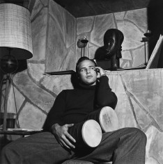Sid Avery, Marlon Brando with Bongo Drums  at his Beverly Hills Home, 1955
