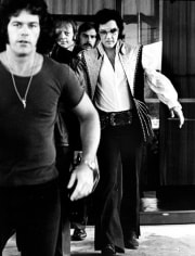 Ron Galella Elvis Presley and his fifteen bodyguards leaving the Hilton, Philadelphia, June 25, 1974