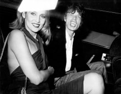 Ron Galella, Mick Jagger and Jerry Hall at a party for Reid Rogers, Limelight, New York, 1984
