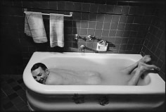 Mary Ellen Mark, Donald Sutherland relaxes in a bathtub between takes  on the set of The Day of the Locust,  Los Angeles, California, 1974