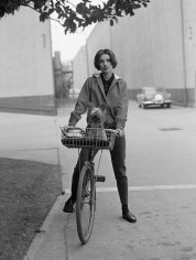 Sid Avery, Audrey Hepburn on her bike at Paramount, Los Angeles, California 1957