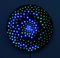 LEO VILLAREAL Little Bang (cool view) 2008, 200 light emitting diodes, microcontroller, circuitry and anodized aluminum, 24 inches (diameter)