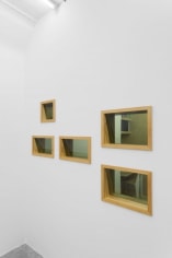 A side view of this artwork (5 rectangles framed in wood)