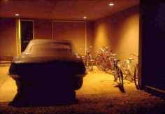 William Eggleston, Untitled, (Car and Bicycles in Garage) Memphis, TN, 1970, dye-transfer print, 16 &times; 20 in.