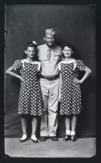 Mike Disfarmer,&nbsp;Soldier with Two Girls&nbsp;in Polka Dot Dresses, 1943, 17 x 12 in.