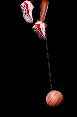Hank Willis Thomas, Basketball and Chain, 2003, digital C-print, 96 &times; 50 in.