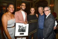 Carrie Mae Weems, Kasseem &quot;Swizz Beatz&quot; Dean, Donna Karan, and Peter Beard were this years honorees. Seen here with Tommy Hilfiger.