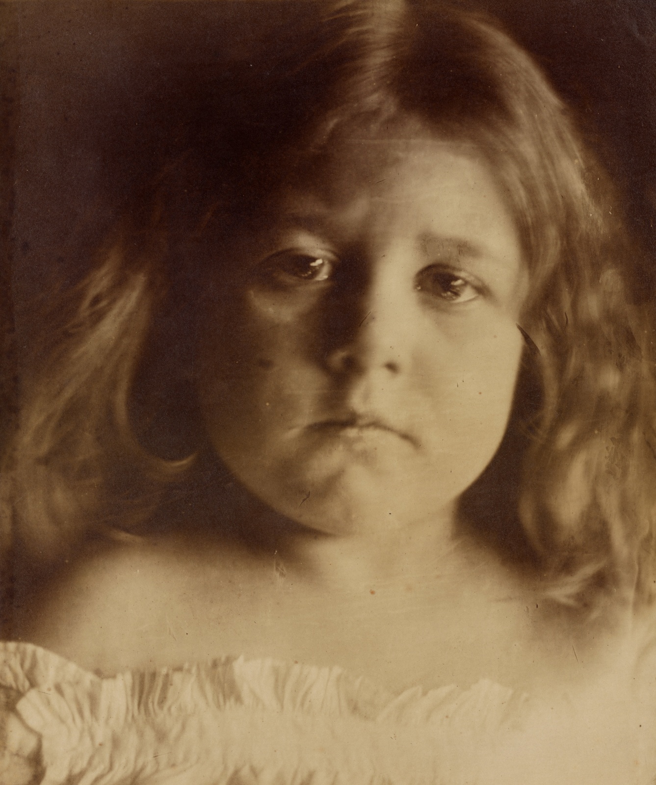 Julia Margaret CAMERON (English, born in India, 1815-1879) &quot;Baby Blossom&quot; Alice Keown, c.circa 1866 Albumen print from a wet collodion negative 34.1 x 27.8 cm