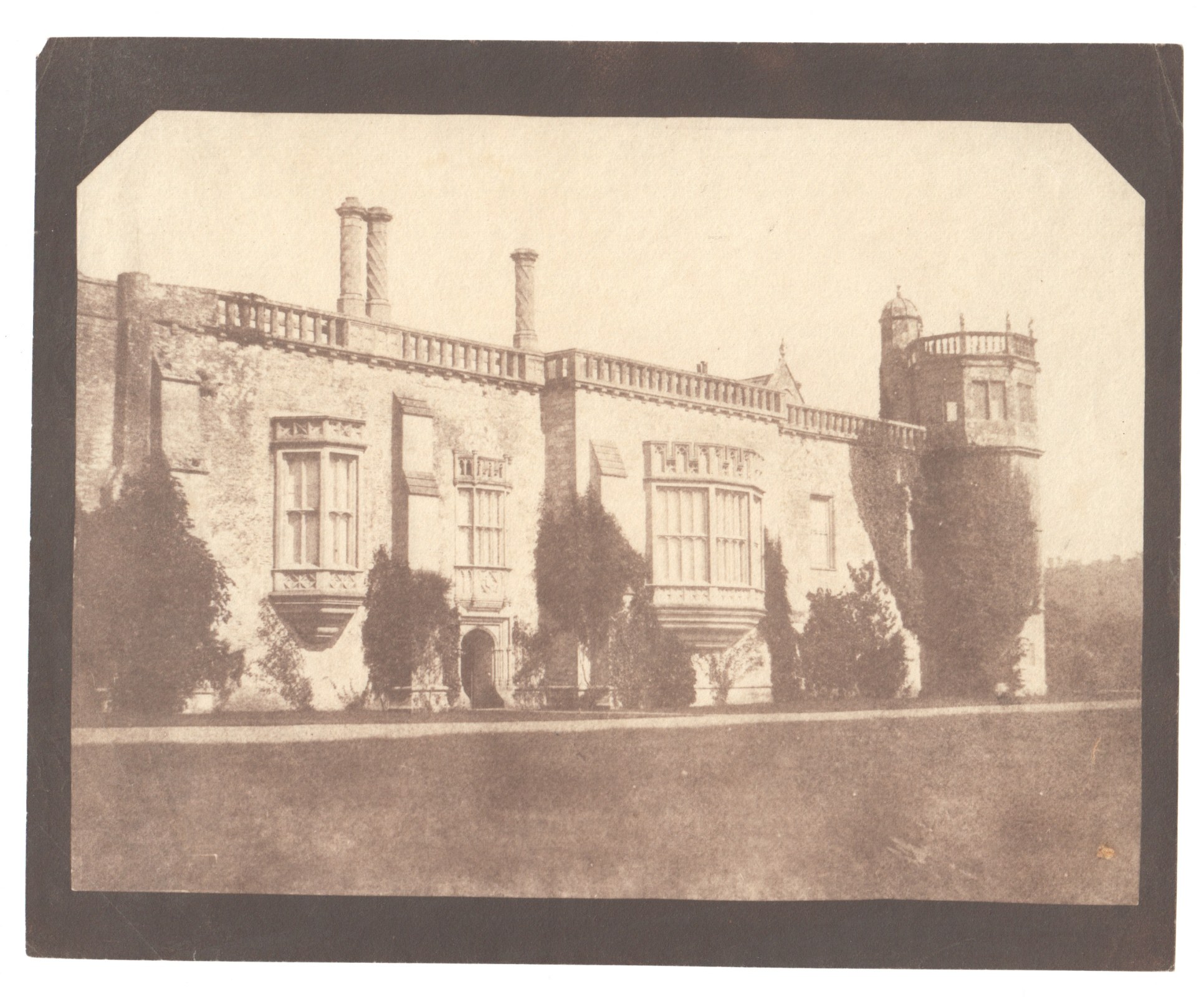 William Henry Fox TALBOT (English, 1800-1877) South front of Lacock Abbey, towards Sharington's Tower, 1842-1843 Waxed salt print from a calotype negative 15.5 x 21.1 cm on 18.3 x 22.6 cm paper
