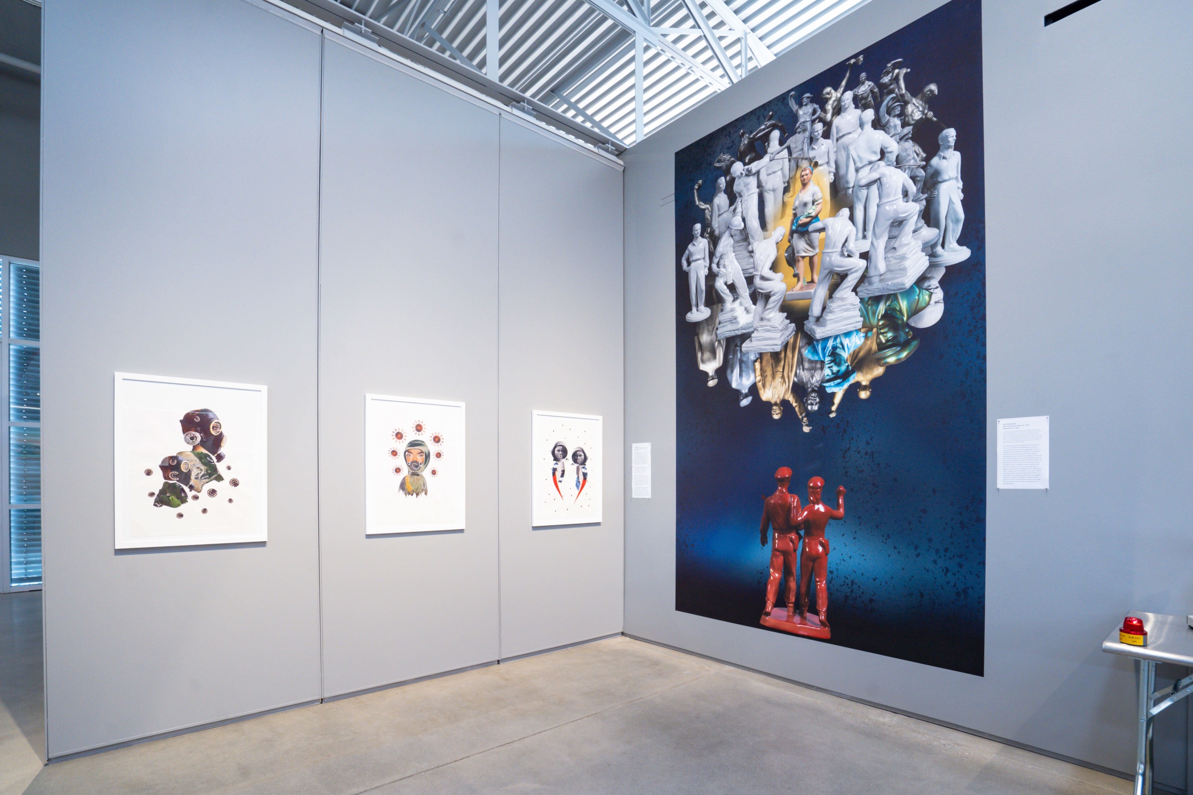 Installation view of&nbsp;Ken Gonzales-Day&#039;s&nbsp;Monumental Vision: Labor/Lenin (2020, pigment print on vinyl, 96 x 48 in), featured in&nbsp;Transformations: Living Room &amp;gt; Flea Market &amp;gt; Museum &amp;gt; Art at the Wende Museum.&nbsp;All objects referenced in this work are in the collection of the Wende Museum.