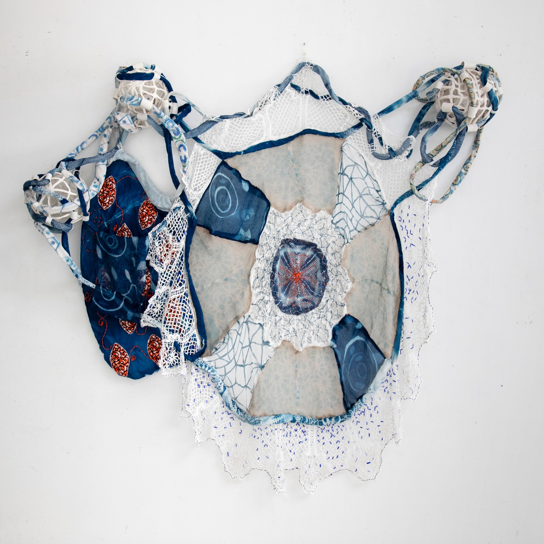 Fran Siegel Dispersed Painting-Fanny, 2024 Pigment, indigo, cyanotype, embroidery, quilted fabric, porcelain and wood mounts 88 x 107 x 12 in (223.5 x 271.8 x 30.5 cm)