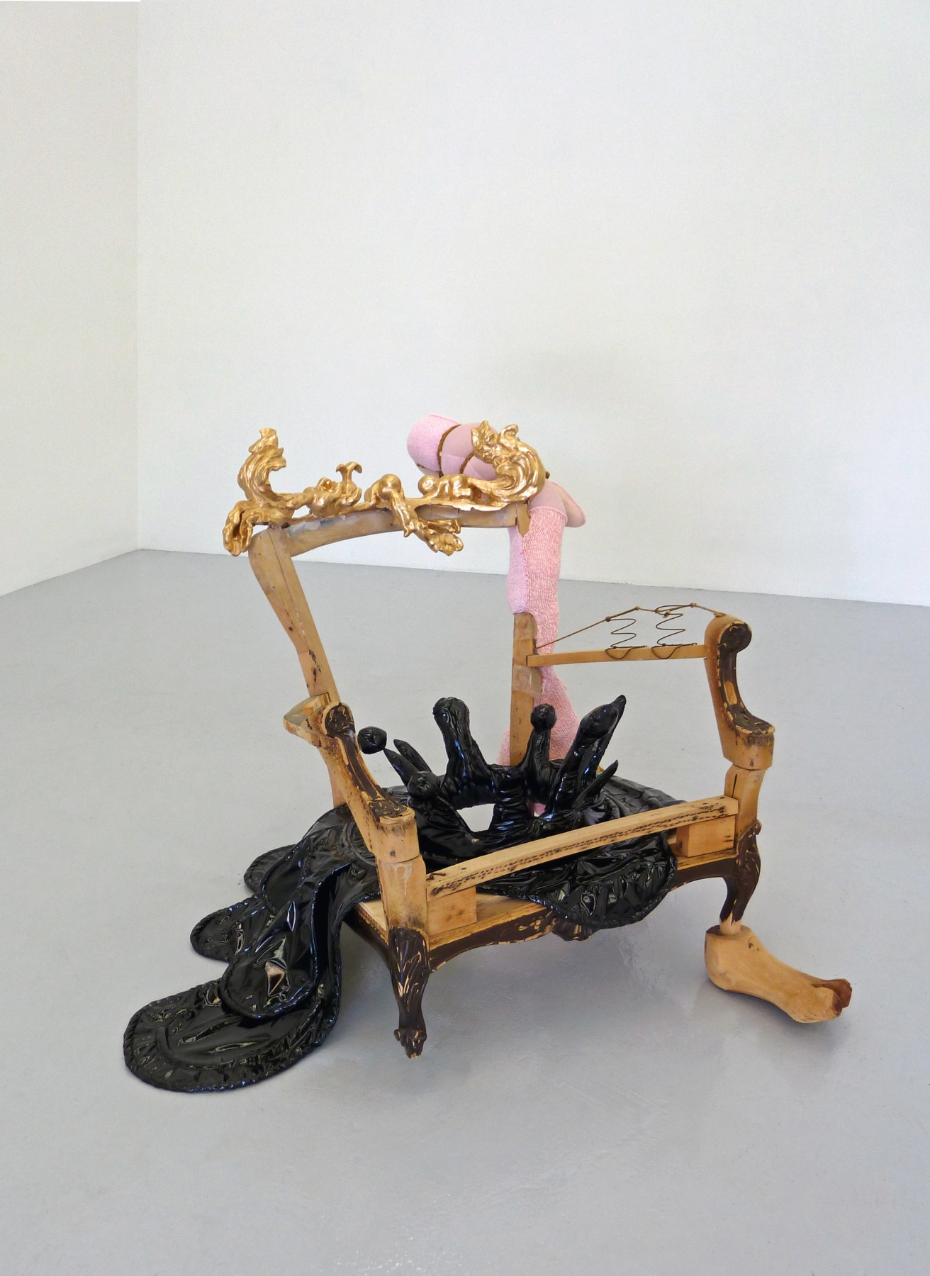 Miyoshi Barosh Composition with Chair I, 2011 Wooden chair frame, carved wood, knitted fabric, patent leather, rope ​39 x 45 x 60 in.