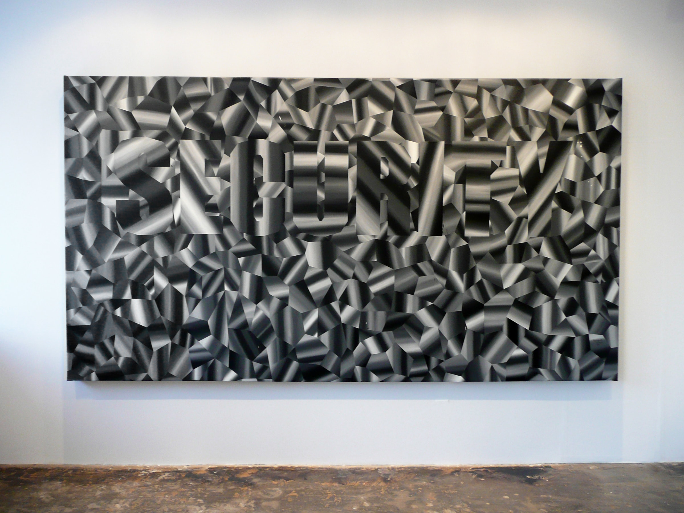 Installation View of Daniel Ruanova's DEFEND: SECURITY | Constructs of a People Fearing Society.