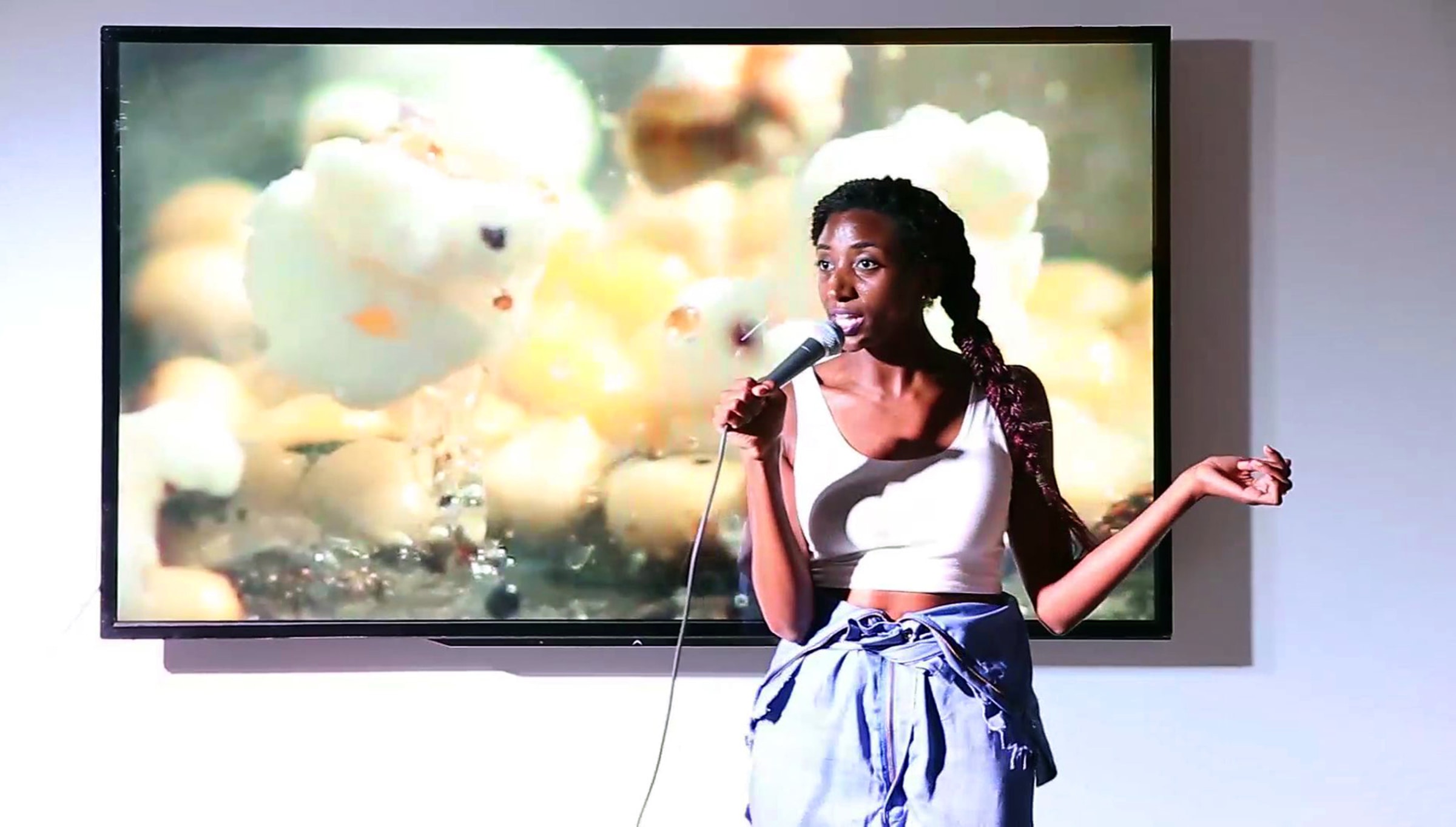 Lex Brown performing at the opening reception of HA! HA! BUSINESS!