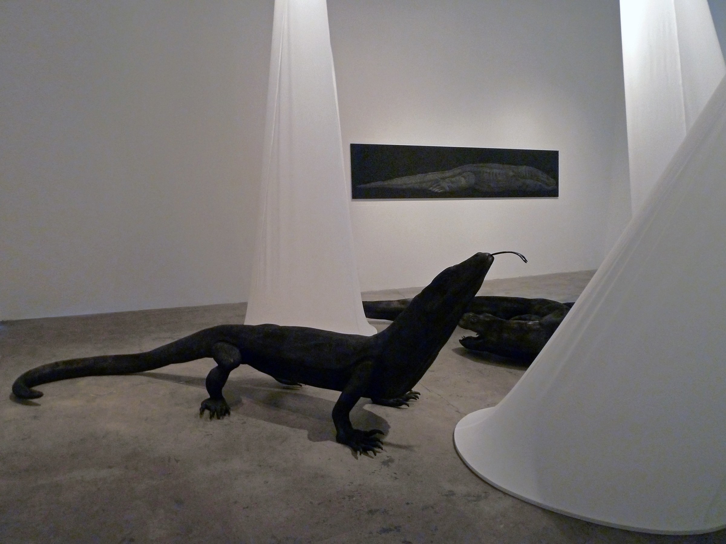 Installation View of Marisol Rend&oacute;n: So, Dragons Do Exist?  2013 Wood, fabric, lighting Variable dimensions.