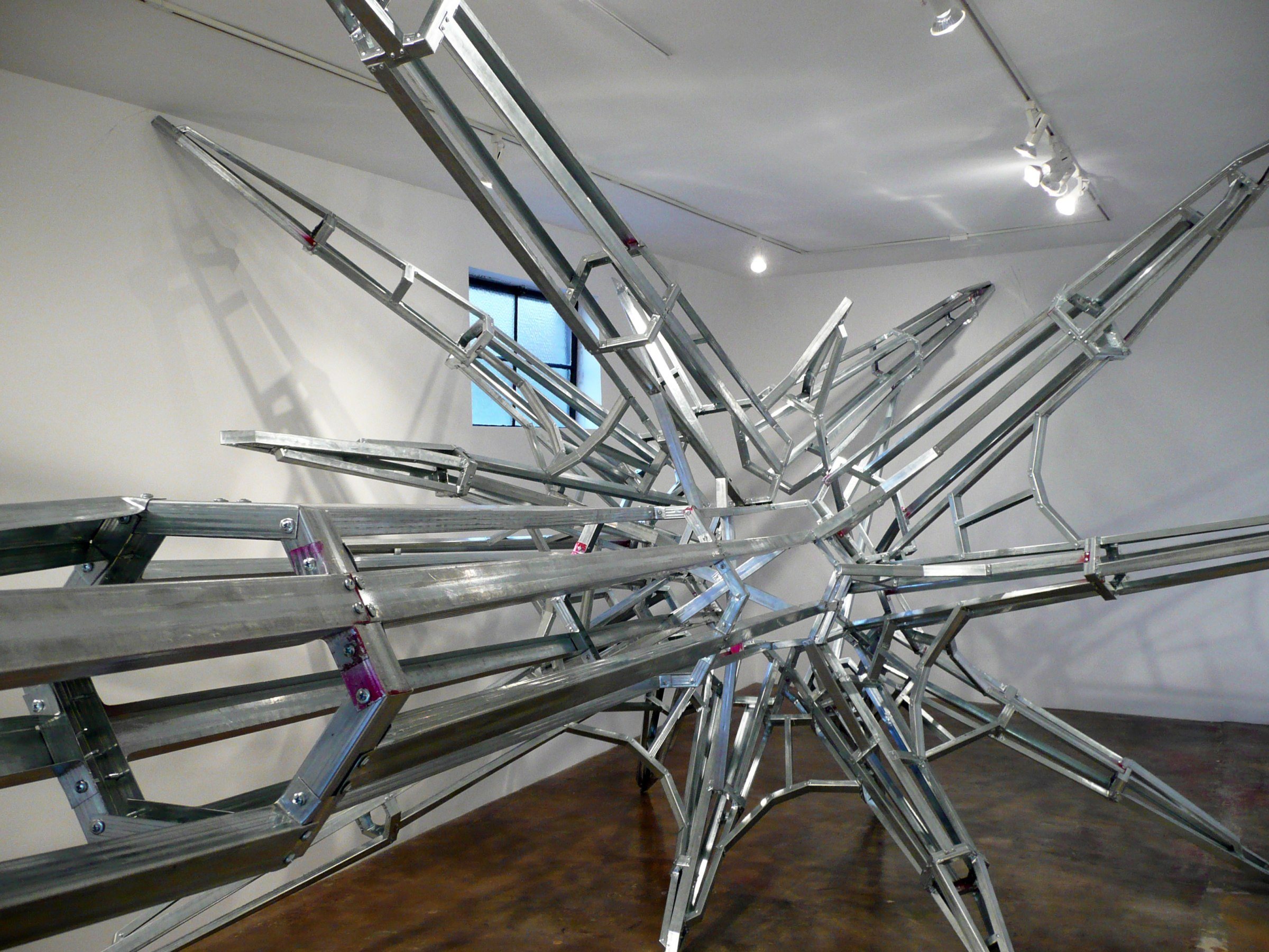 Installation View of Daniel Ruanova's DEFEND: SECURITY | Constructs of a People Fearing Society.