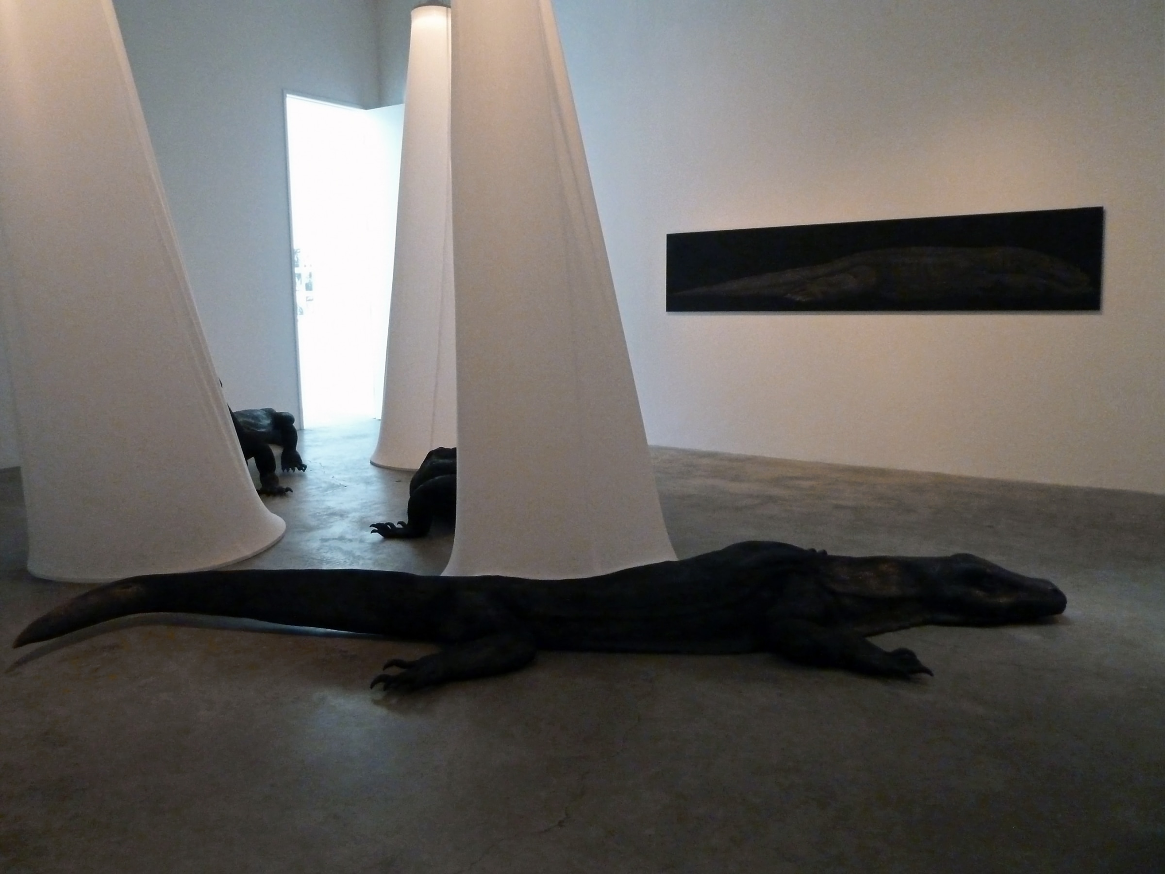 Installation View of Marisol Rend&oacute;n: So, Dragons Do Exist?  2013 Wood, fabric, lighting Variable dimensions.