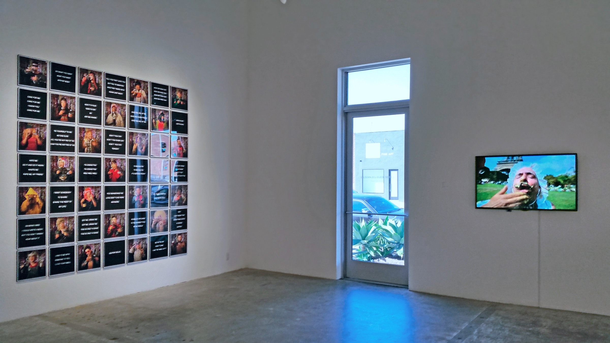 Installation View with photographs and videos  by Juan Pablo Echeverri in HA! HA! BUSINESS! group show at Luis De Jesus Los Angeles