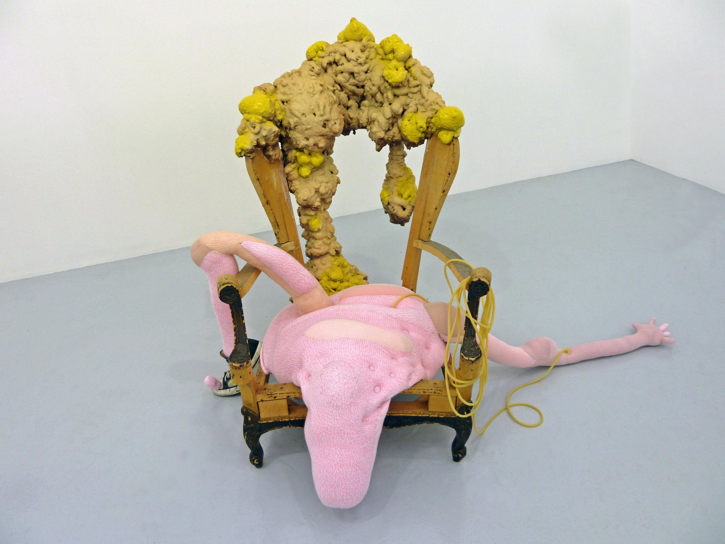 Miyoshi Barosh Composition with Chair II, 2011 Wooden chair frame, knitted fabric, tennis shoe, urethane tube, bondo, paint ​48 x 80 x 54 in.