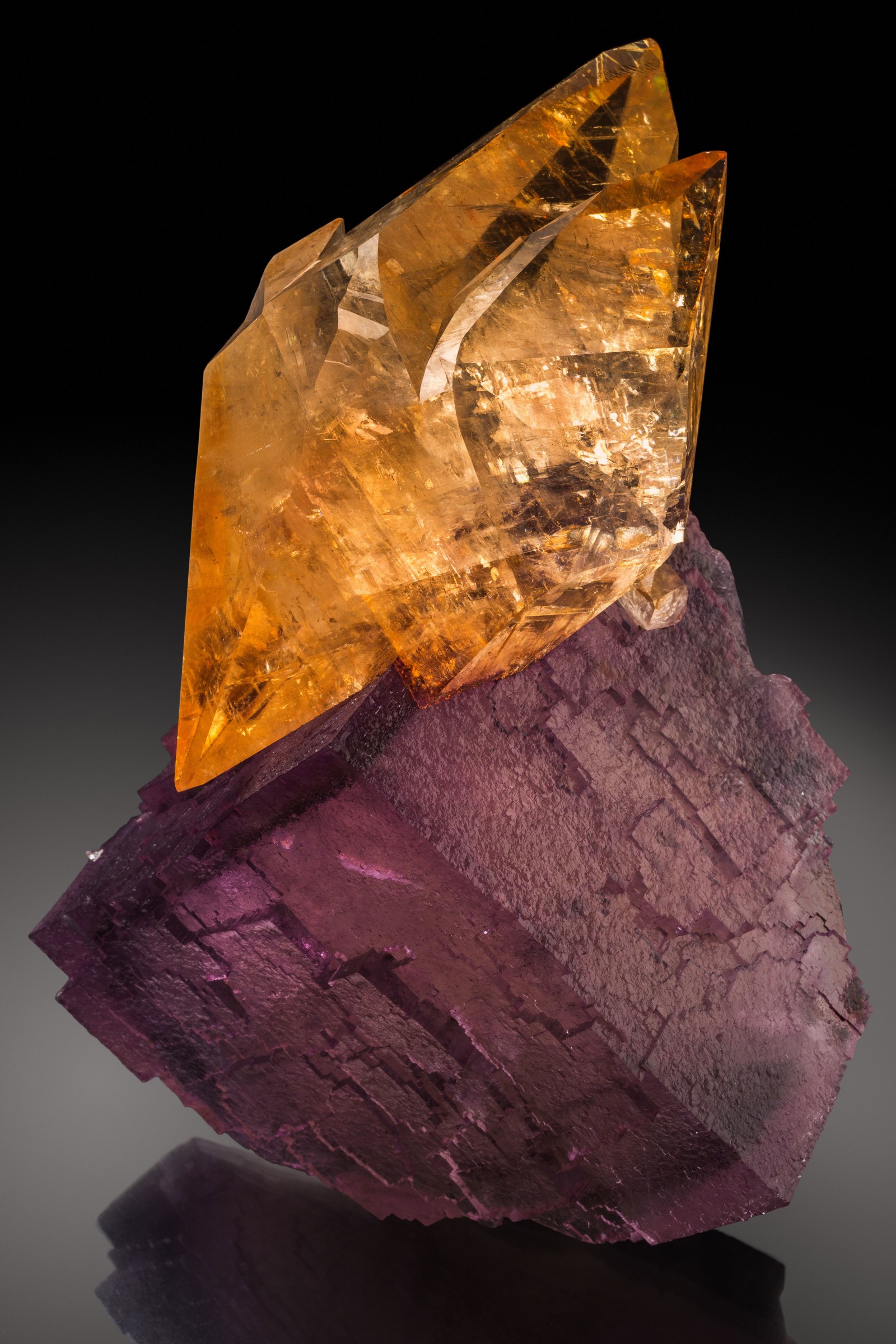 Calcite on Fluorite, Elmwood Mine, Smith County, Tennessee, USA

If color, transparency and sculptural shape are the three principal criteria by which we define the aesthetics of a mineral specimen, then this calcite and fluorite combination from the Elmwood mine must surely be one of the most aesthetic minerals ever to have been recovered from the earth! The piece also manages to combine a beautiful combination of surface textures, with the glassy luster of the calcite contrasting with the sculptural texture of the fluorite