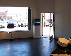 Installation view of lamp and homemade drum kit