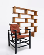Charlotte Perriand's armchair, installation view with Perriand's bookshelf