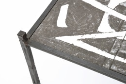 Robert and Jean Cloutier's ceramic coffee table detailed view of metal frame and ceramic top