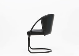 Jacques Adnet chair side view