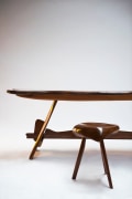 Michel Chauvet's stool installation view with Chauvet's &quot;Poisson&quot; sculptural desk behind