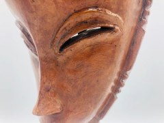 Ren&eacute; Buthaud's mask detail of facial features