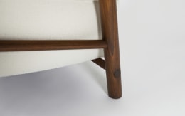 Attributed to Charlotte Perriand, pair of armchairs, detailed view of wooden legs on single chair