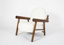 Attributed to Charlotte Perriand, pair of armchairs, single chair diagonal side view
