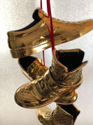 Effigy For a New Normalcy, Hau Great Thou Art, 2018, 24k gold plated Shoes (from collectors Arthur Lewis and Hau Nguyen)