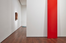 John McCracken, Red Plank,&nbsp;1966;&nbsp;Robert Smithson, Untitled,&nbsp;1967;&nbsp;and Richard Artschwager, Small Construction with Indentation,&nbsp;1966,&nbsp;on view in&nbsp;less: minimalism in the 1960s.