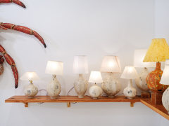 Installation view of Zachary Armstrong: New Work featuring lamps on a wooden shelf by Zachary Armstrong